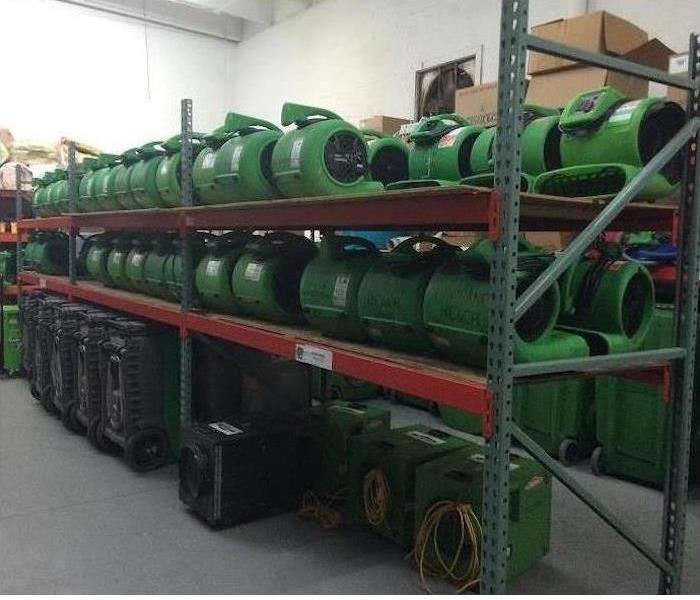Shelves of drying equipment in our warehouse