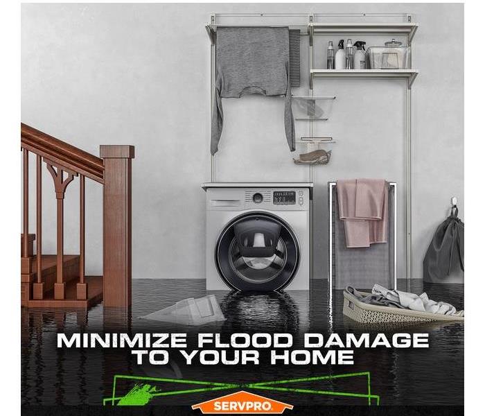 Flooded basement in a home with standing water up to the washing machine.