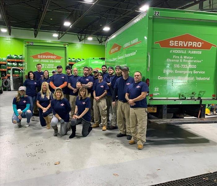 servpro crew group photo with vehicles