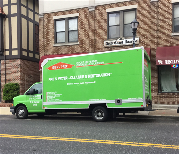 SERVPRO truck parked in front of commercial property
