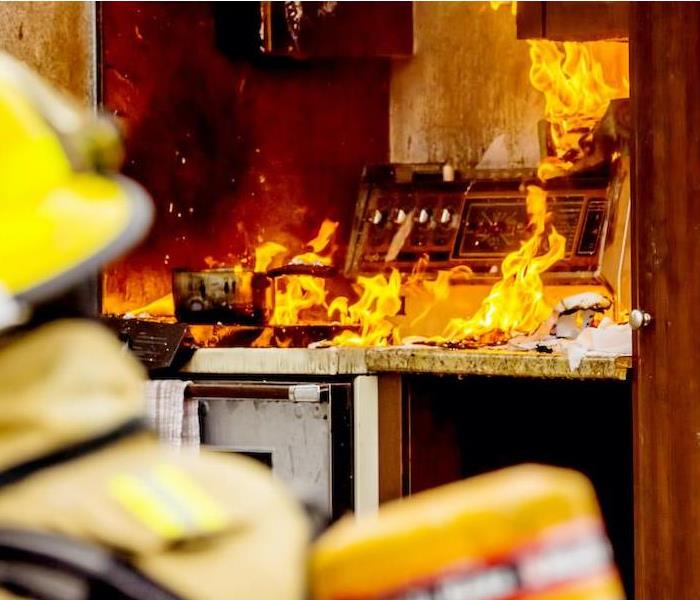 raging fire in kitchen